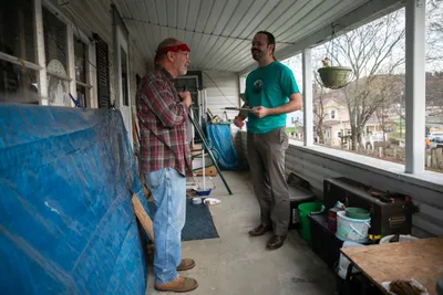 Alex Spragens canvasses door to door talking to voters before the election in Buchtel, OH on November 6, 2023.